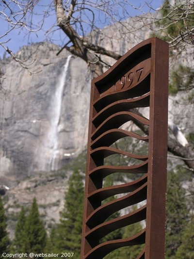 Photo: An artistic sign in Yosemite shows the level of the flood waters during the 1997 flood with upper Yosemite Falls in the background. Photo by Ernie Bonacum. Photo: An artistic sign in Yosemite shows the level of the flood waters during the 1997 flood with upper Yosemite Falls in the background. Photo by Ernie Bonacum.